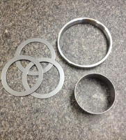 Mechanized precision steel components by SC Industries Inc. | High quality rings and washers for industrial applications. Exact tolerances and upper finish.